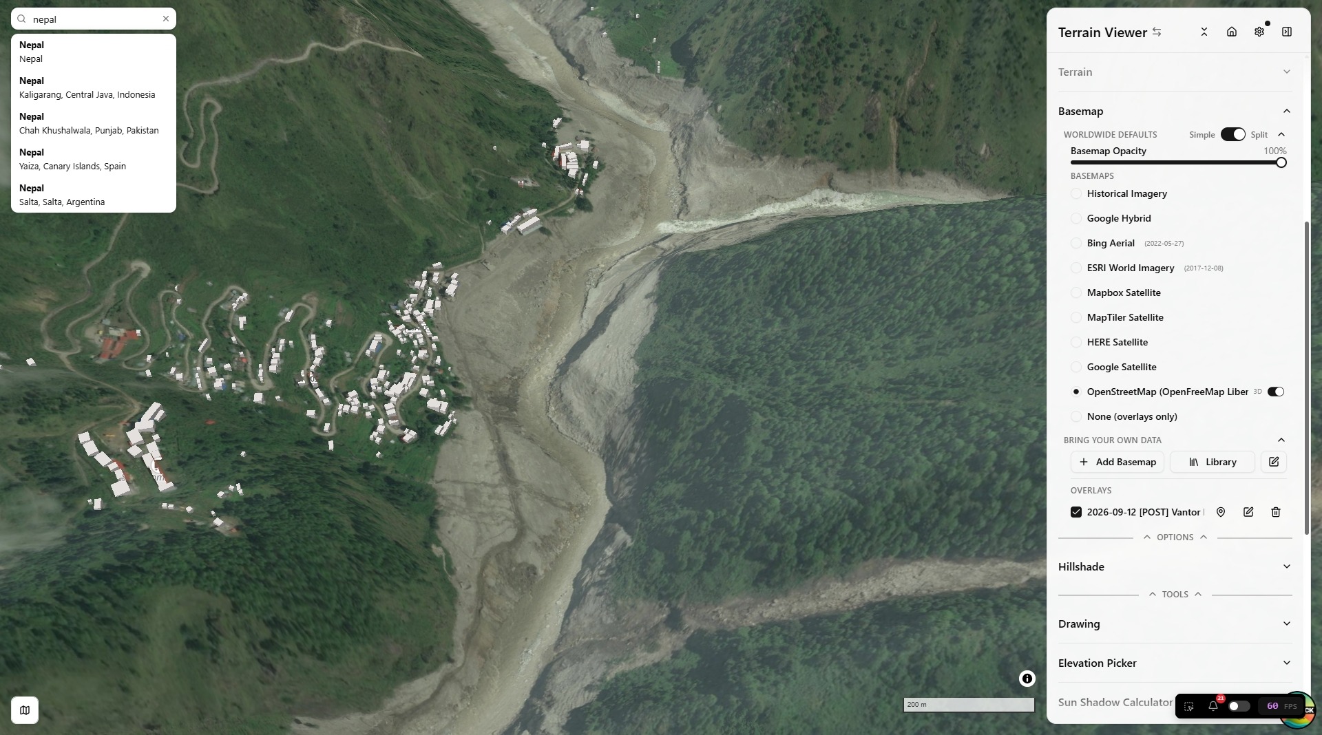 OSM 3D buildings from OpenFreeMap Liberty, here over a Vantor post-event overlay in Nepal